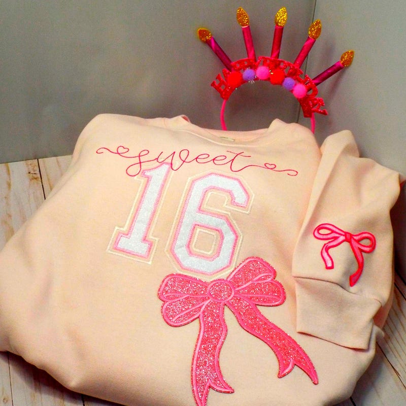 Sweet 16 embroidered sweatshirt with a glitter bow